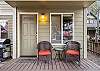 Covered deck with seating for 2. 