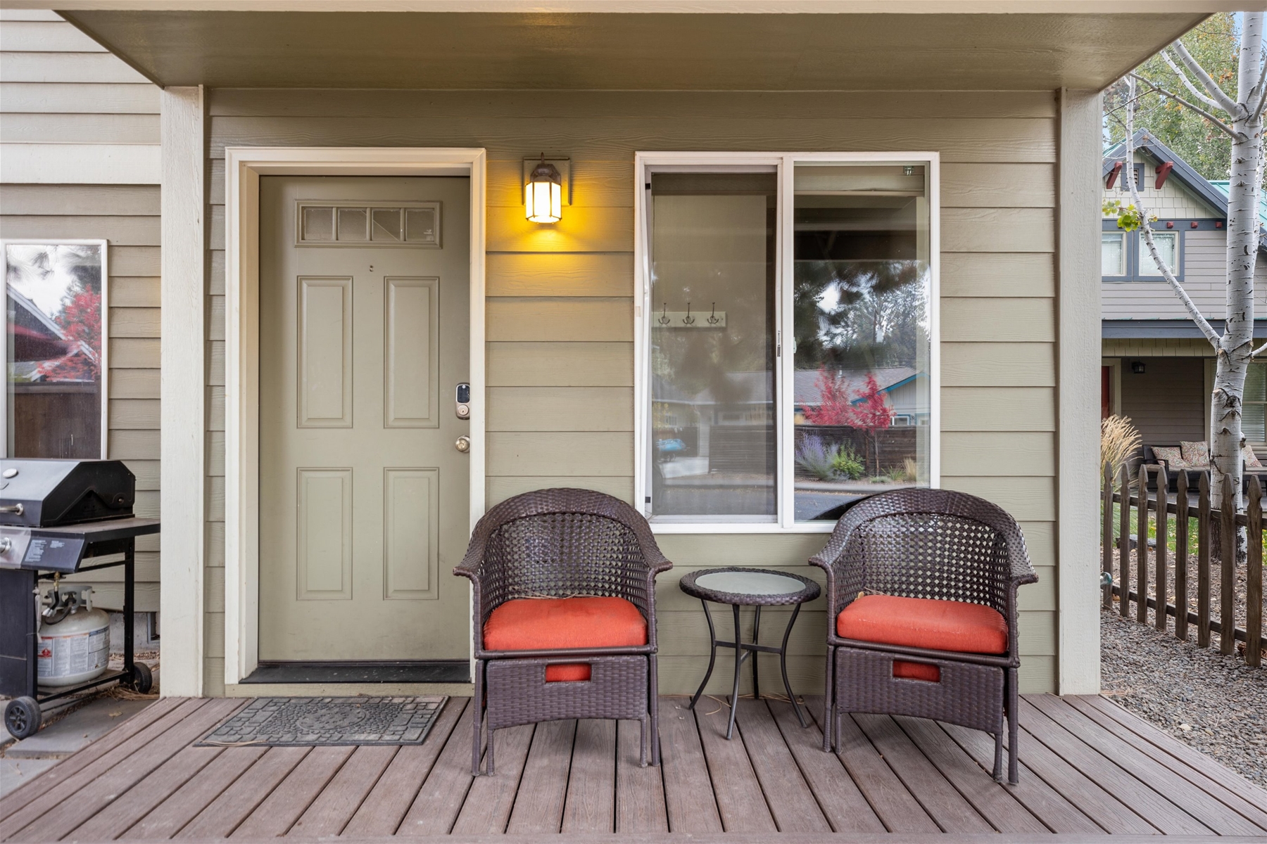 Covered deck with seating for 2. 