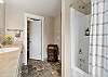 King master suite main bathroom with a combo tub/shower.