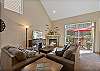 Comfortable living room with queen sofa sleeper. Walk outside to the backyard, patio and hot tub. 