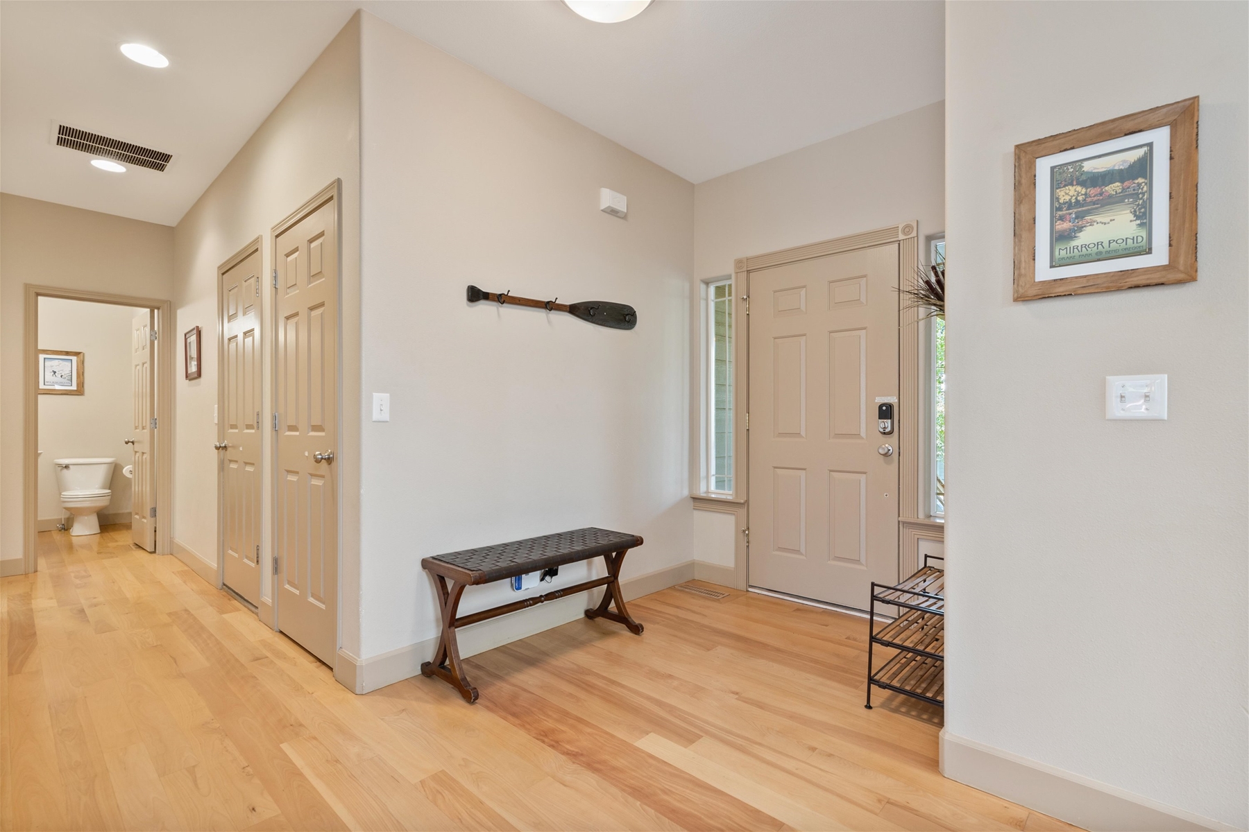 Beautiful hard wood flooring on entry. 