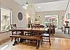Light and bright throughout – open concept living room, dining area, and kitchen. 