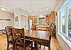Gather comfortably with dining table space for 6 guests and bar seating for 2. 