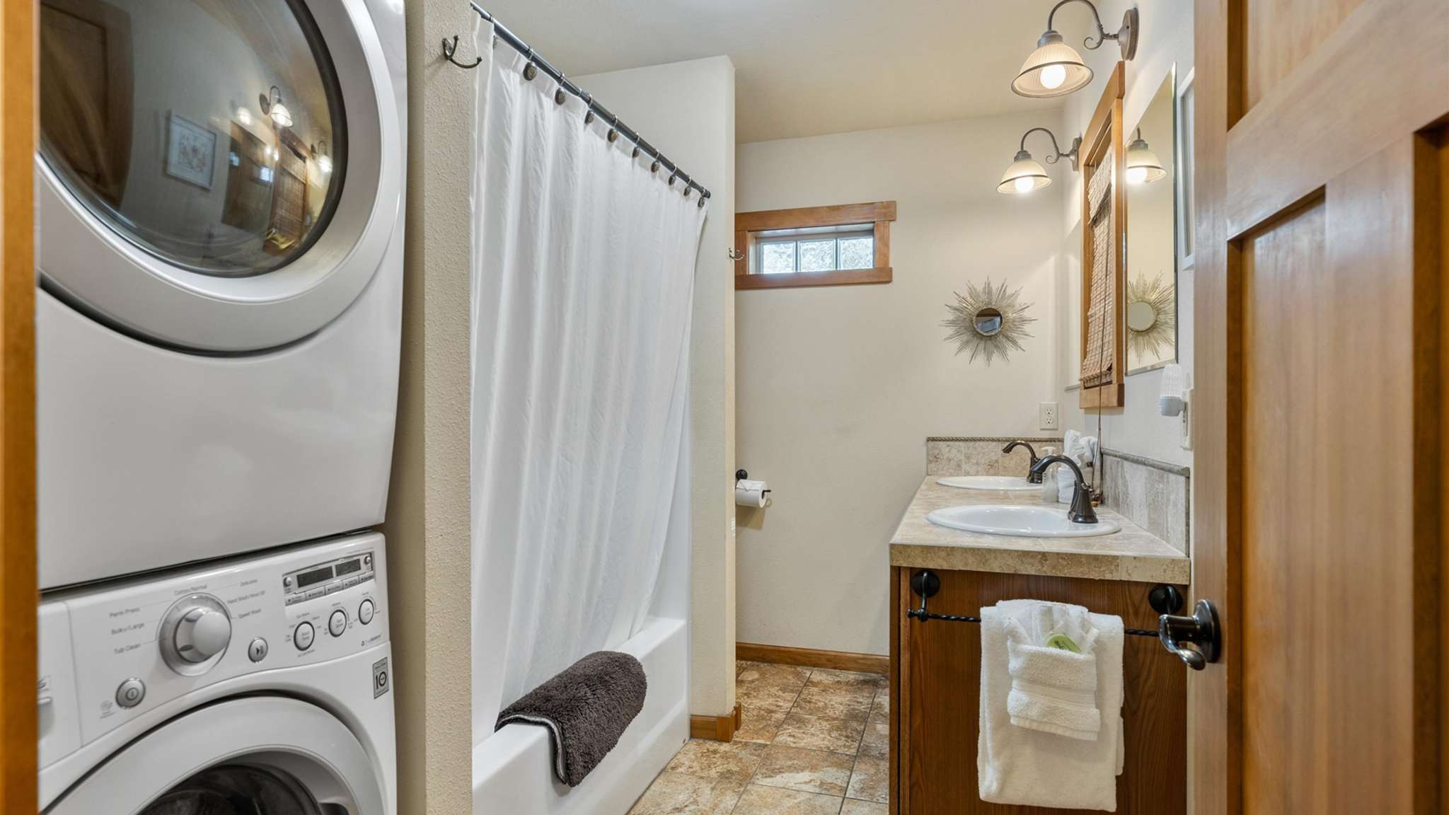 Full bathroom with convenient tub/shower combo. 