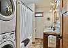 Full bathroom with convenient tub/shower combo. 