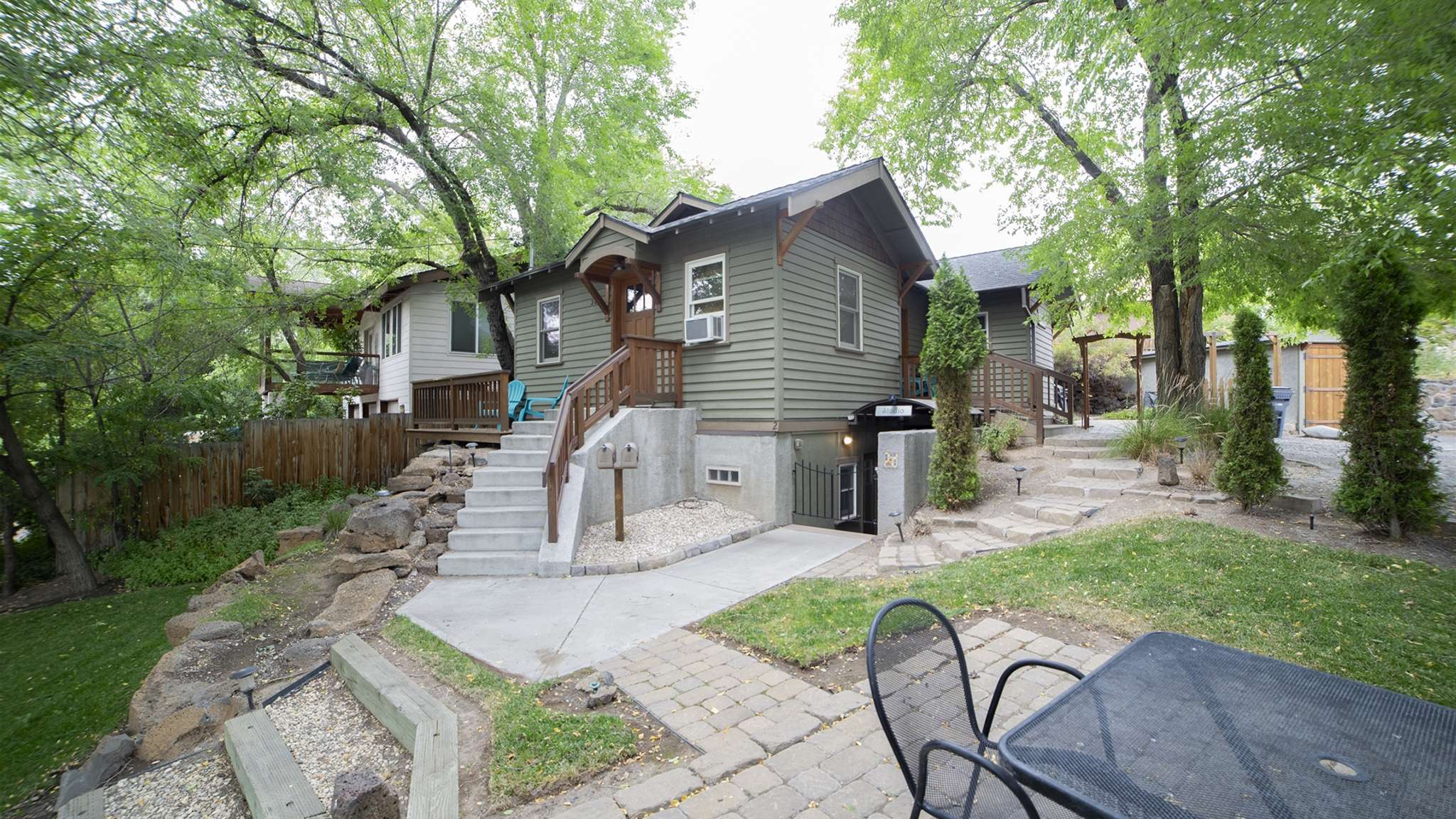 Exterior view showing both the cottage and the studio entrances. 
