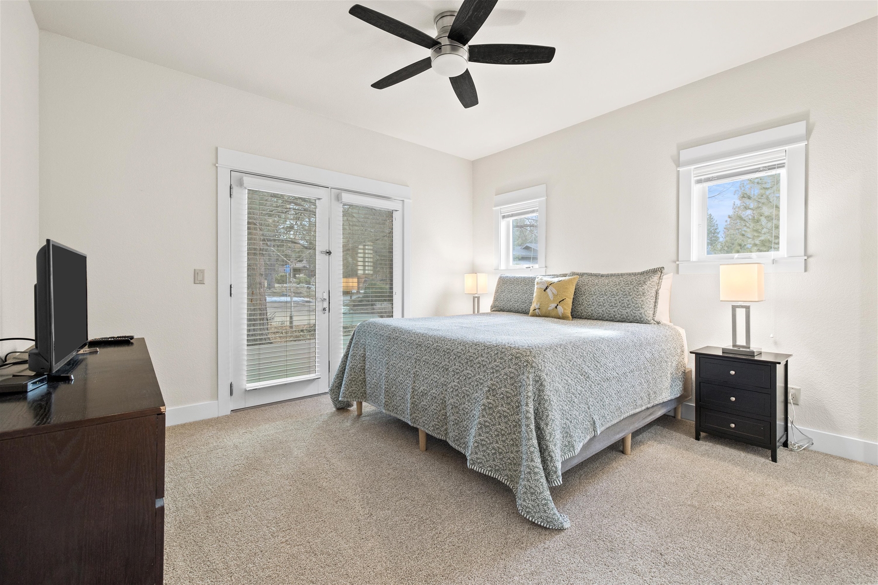 King main suite with private entrance to deck, main level. 