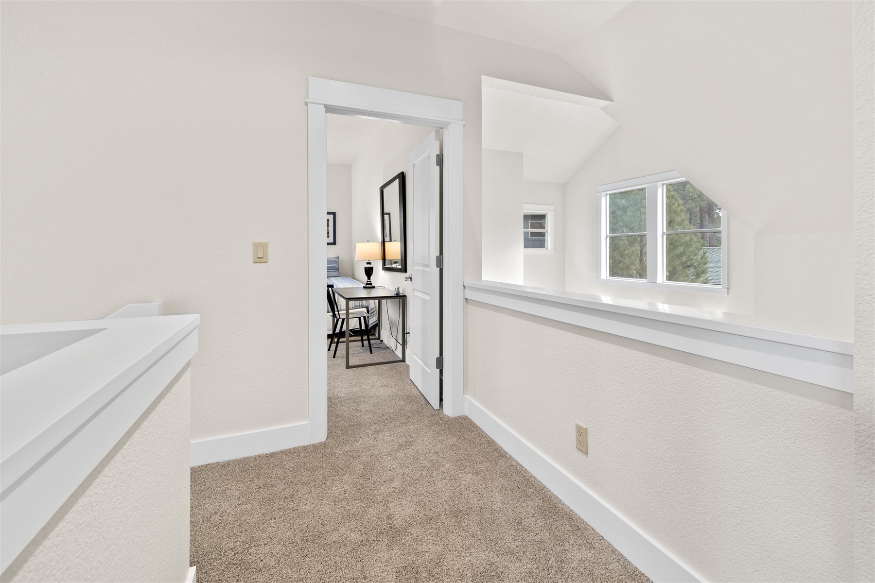 Hallway to queen room with work space, upper level.