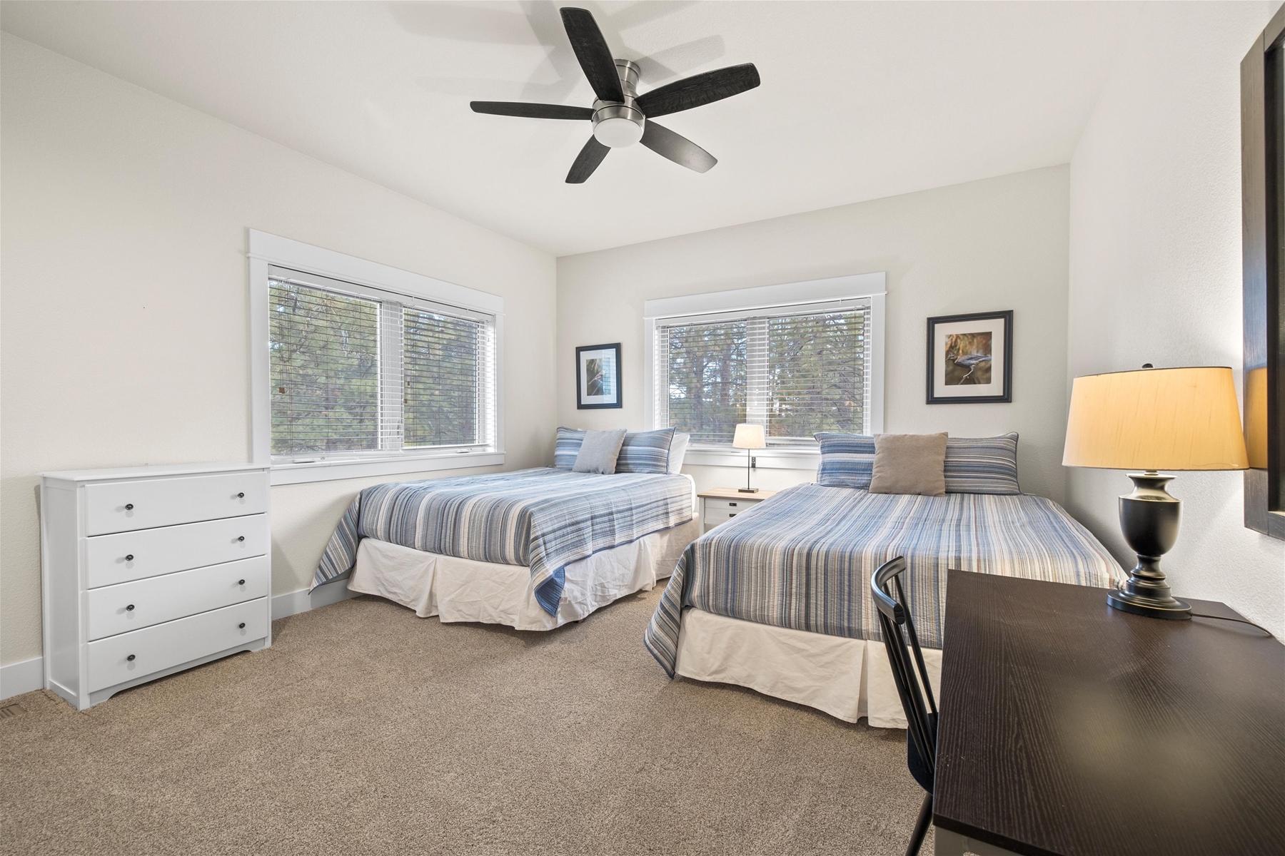 Queen guest room with two queen beds and a work space, upper level. 