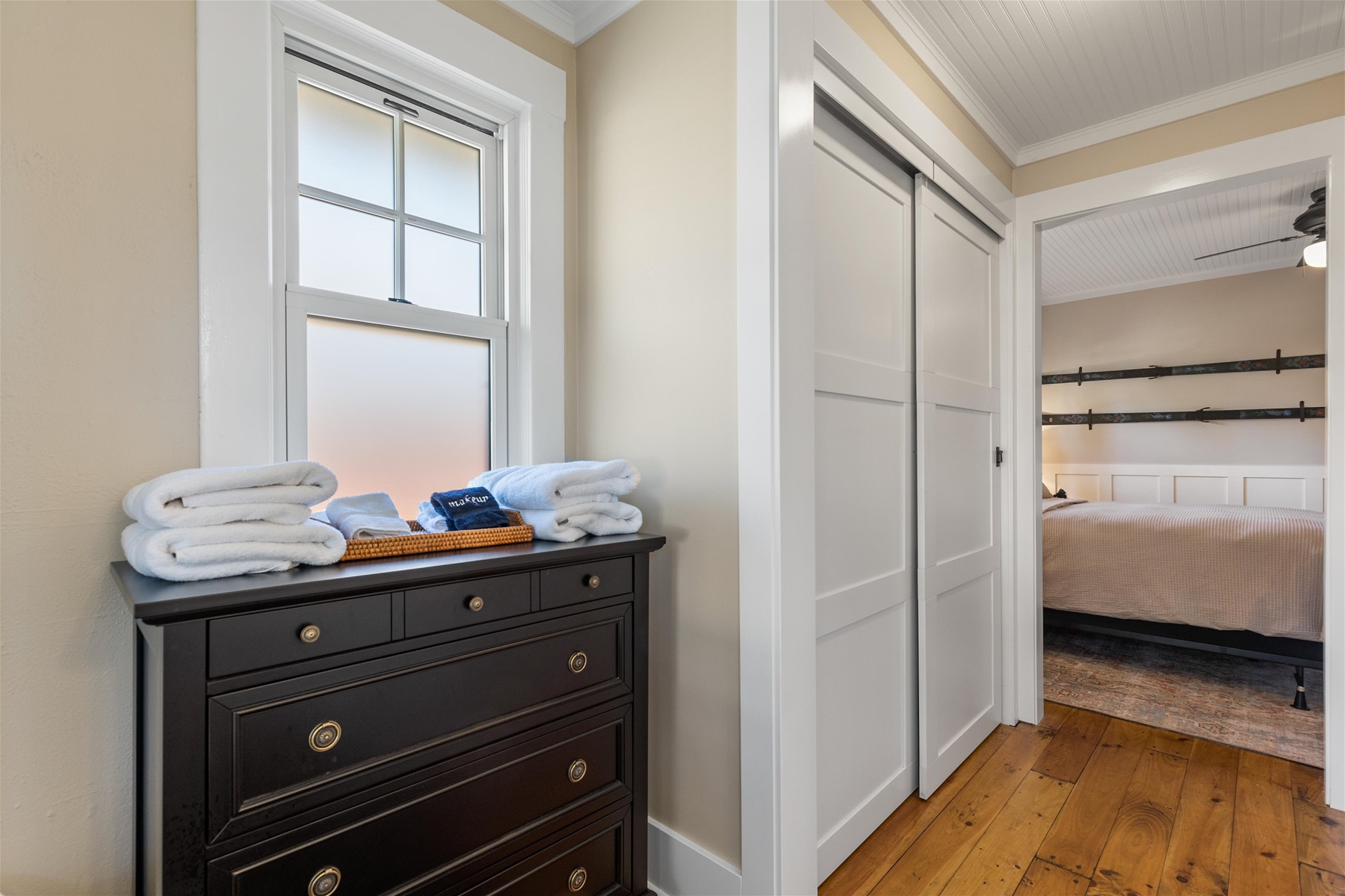 Queen main suite with a private bathroom.
