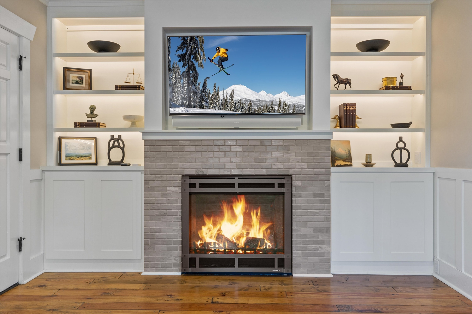 Living room with a fireplace and 55