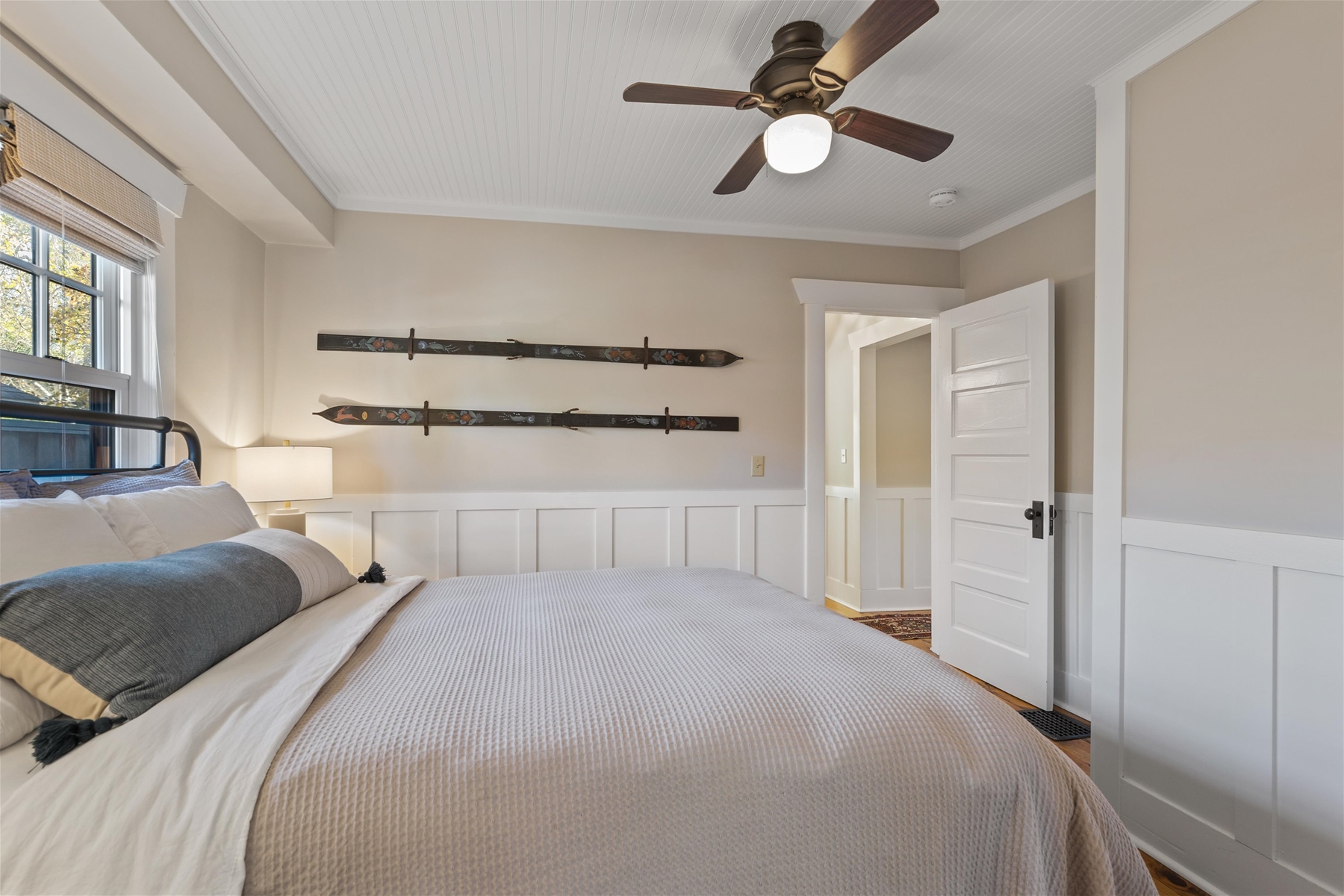 Queen main suite with a private bathroom.