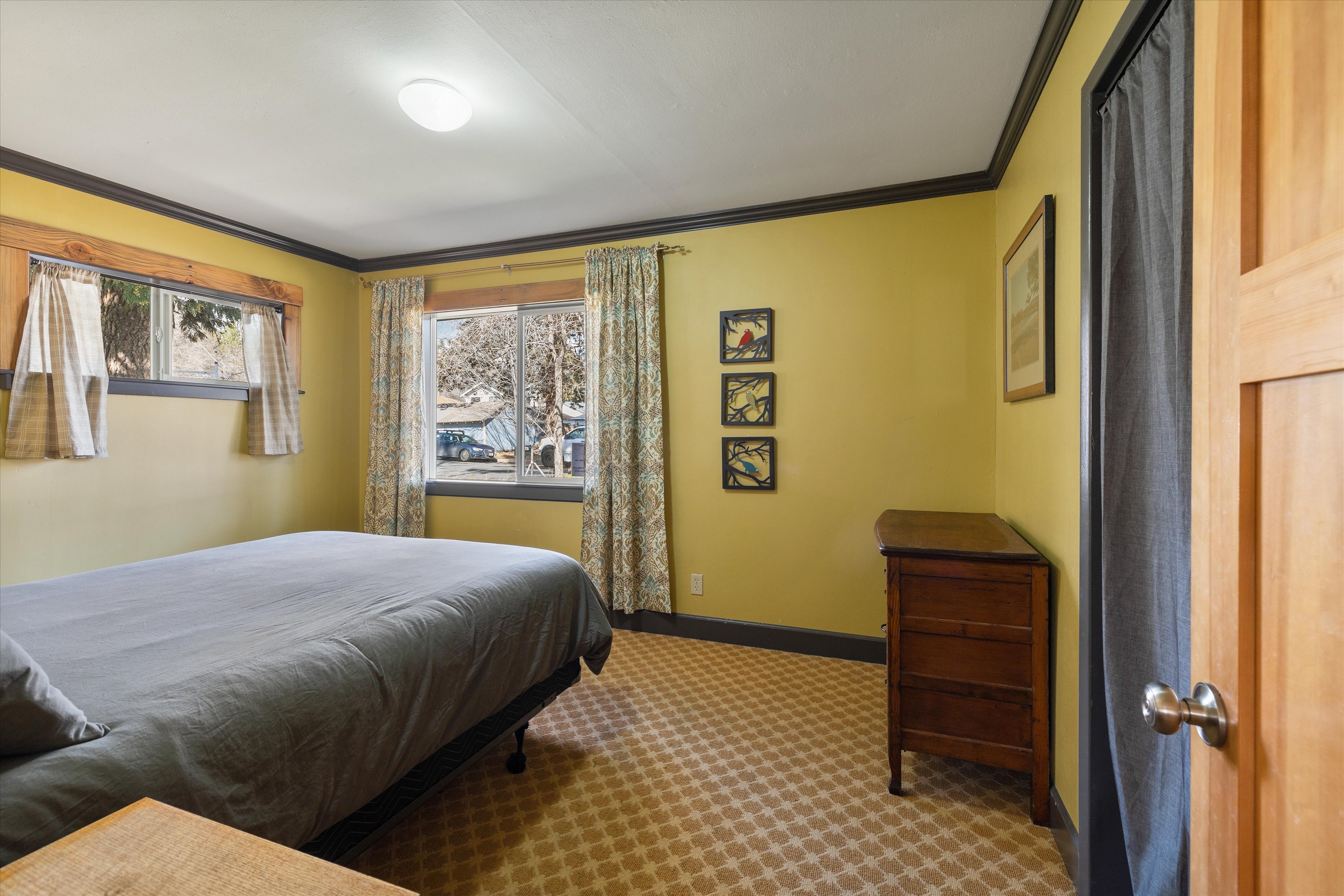 Relax and recharge in this cozy queen bedroom retreat.