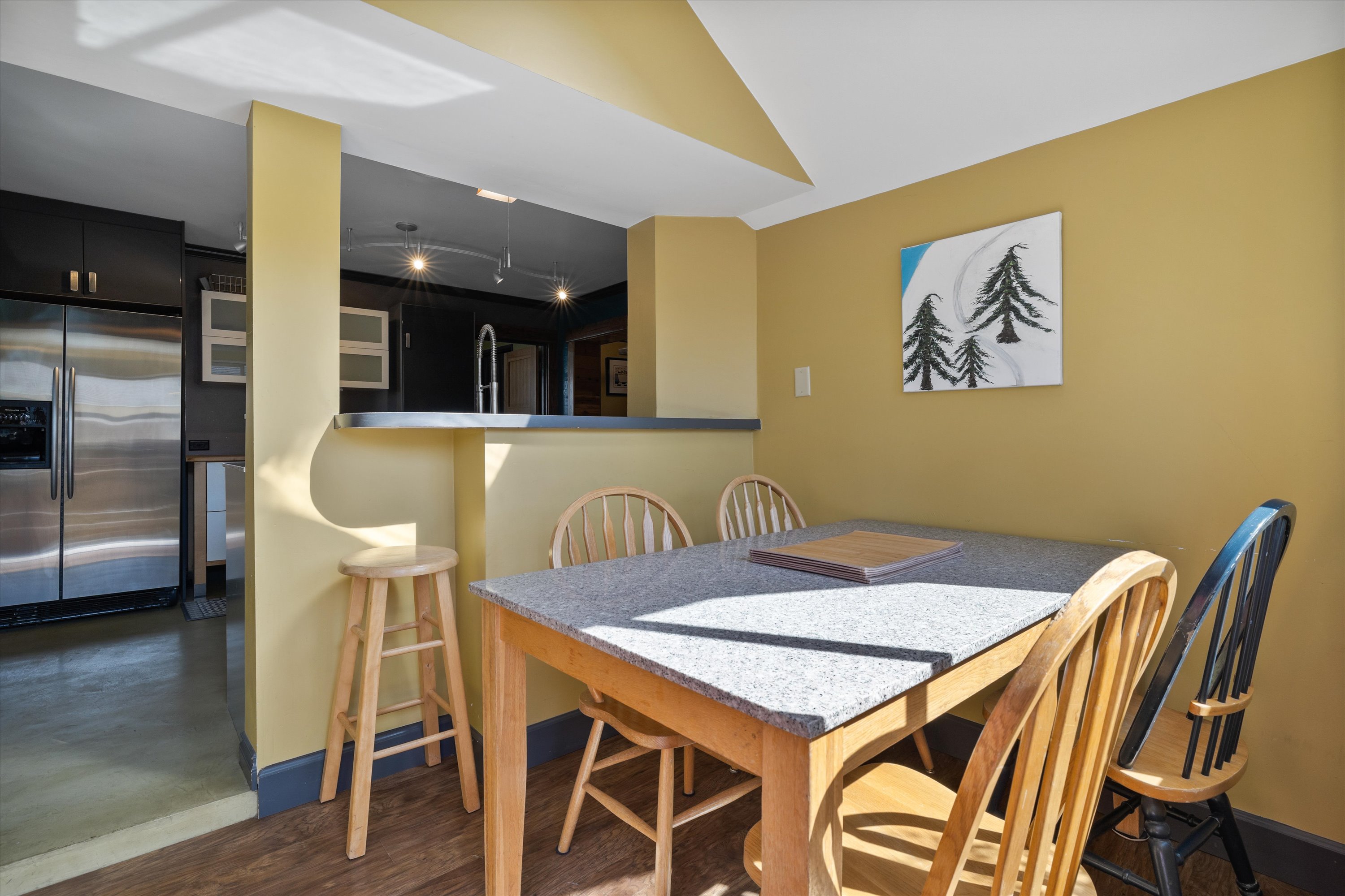 Breakfast nook with granite table and seating for 4.