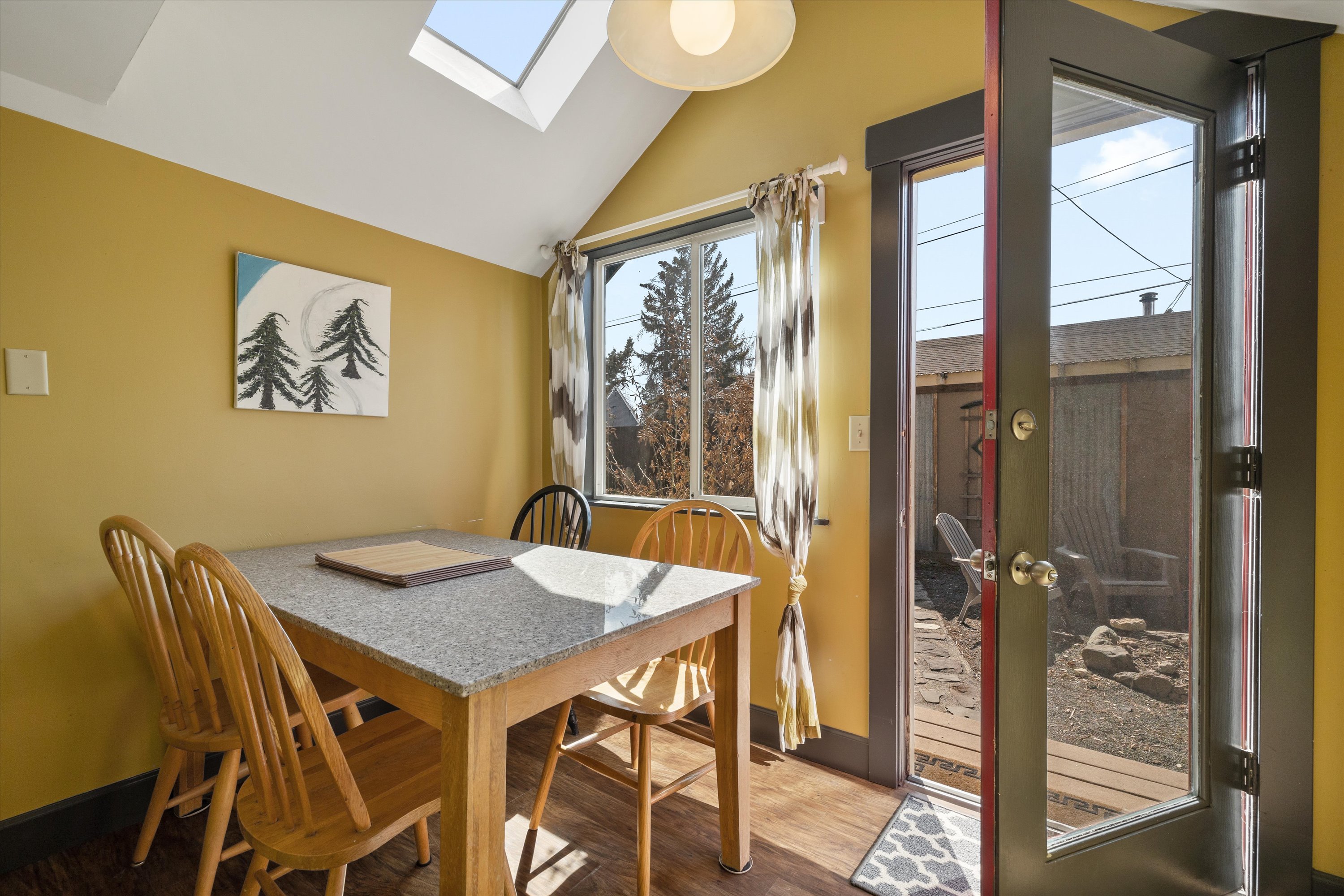 Breakfast nook with granite table and seating for 4.