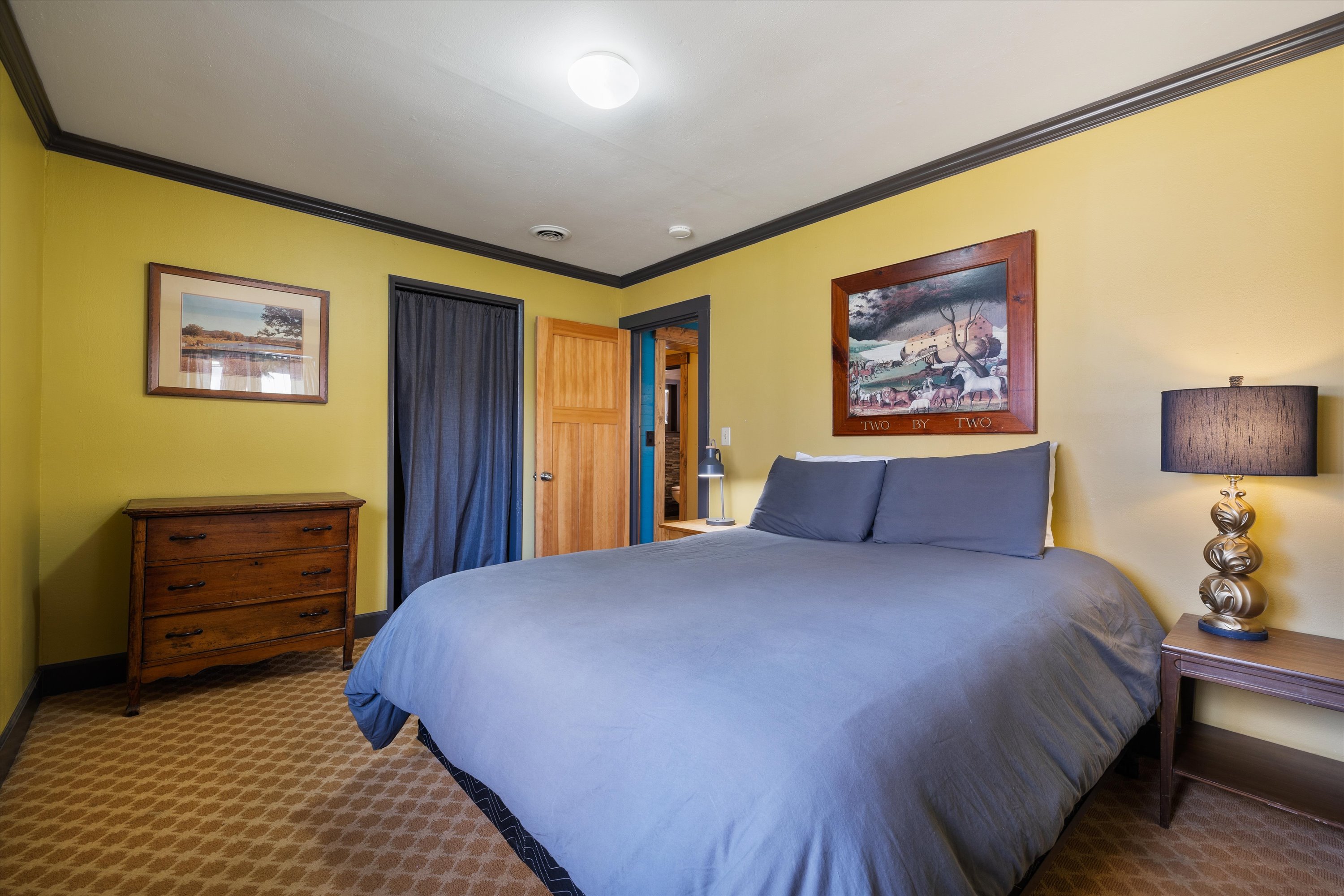 Relax and recharge in this cozy queen bedroom retreat.