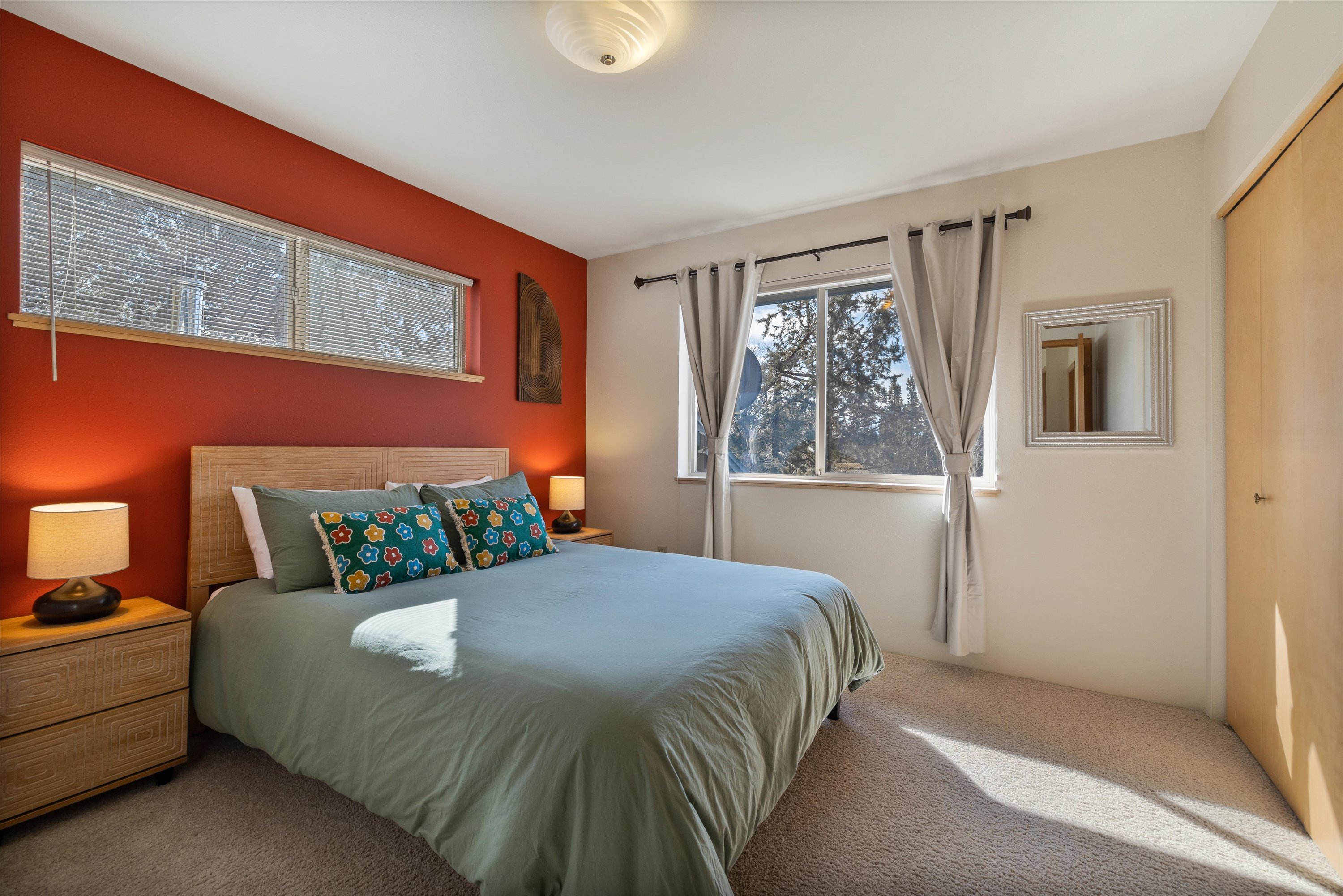 Bright and clean queen bedroom, perfect for a comfortable stay – Upper level. 