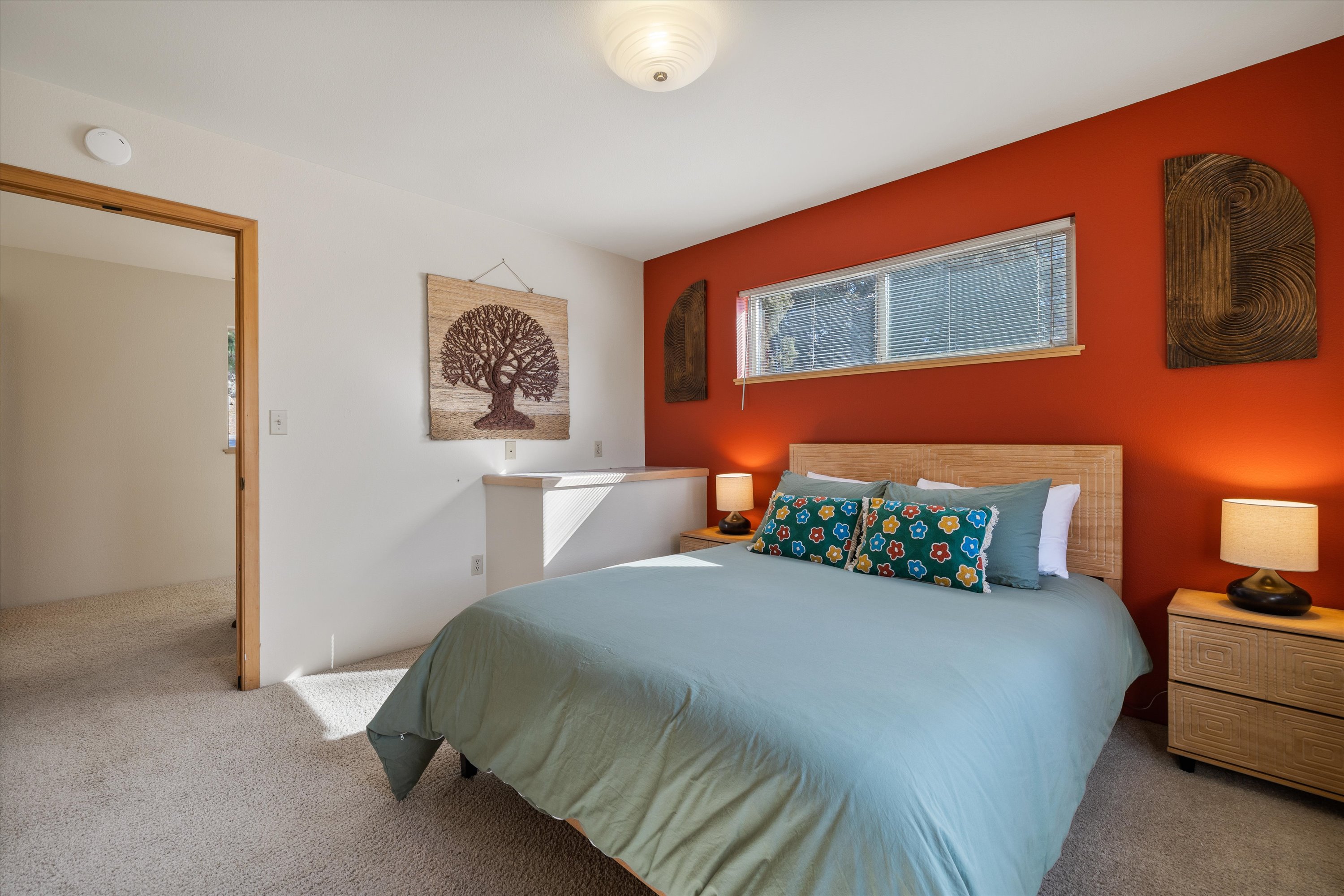 Bright and clean queen bedroom, perfect for a comfortable stay – Upper level. 