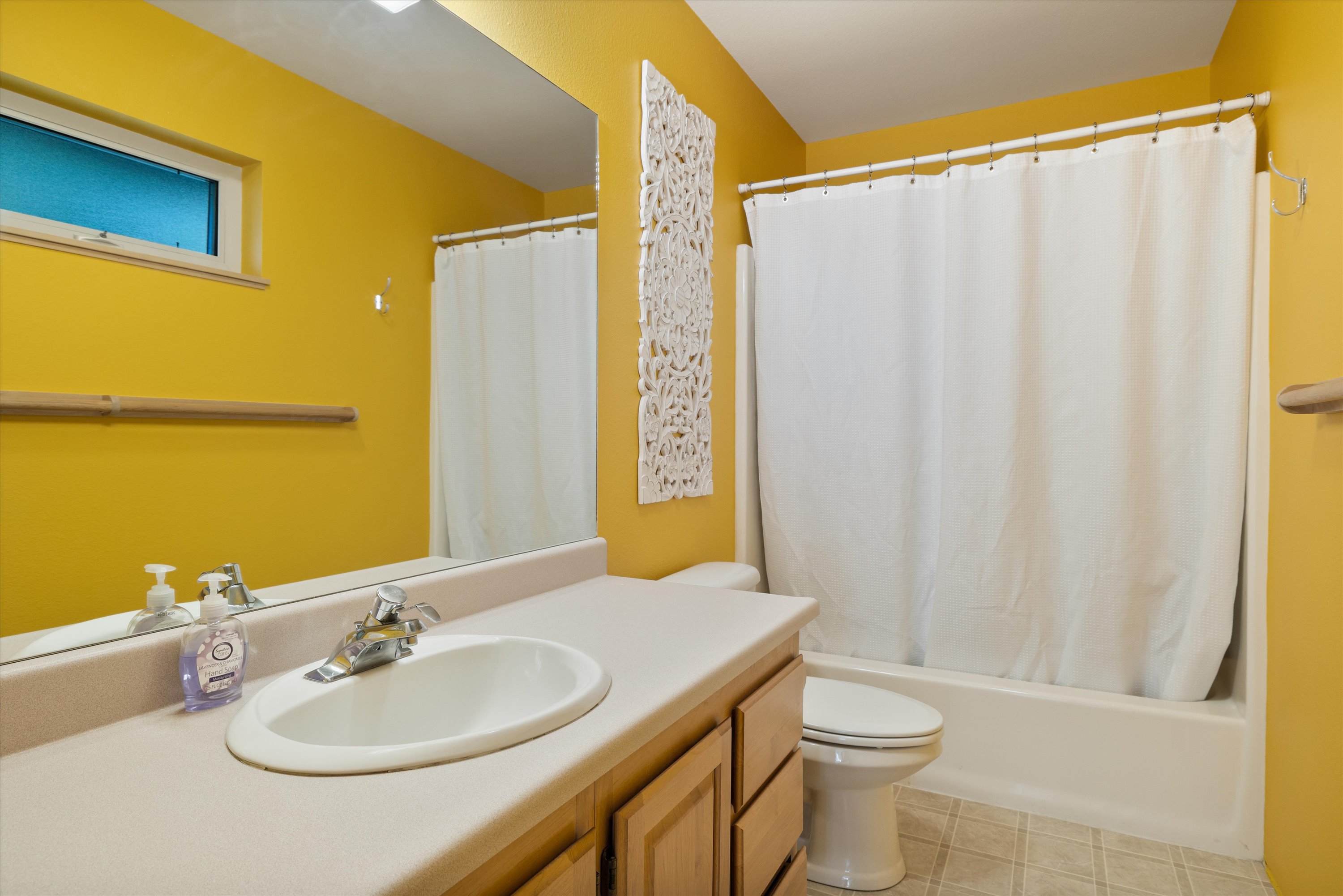 Full bathroom with convenient tub/shower combo – Upper level. 