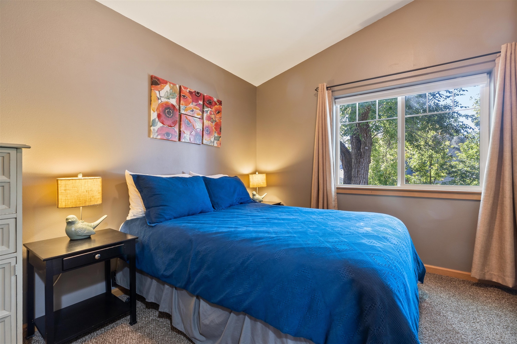 Relax and recharge in this cozy queen bedroom retreat – Upper level. 