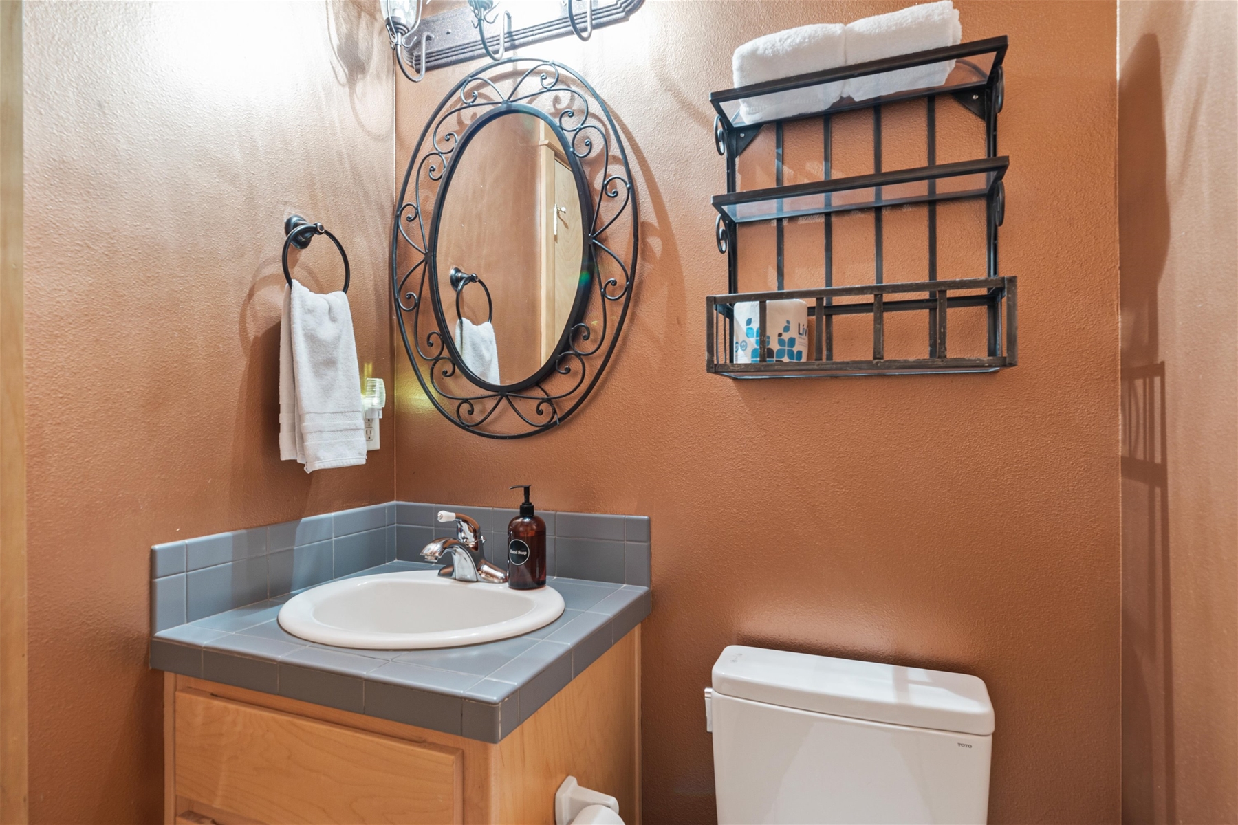 Powder bath, Jack and Jill entrance – main level. 
