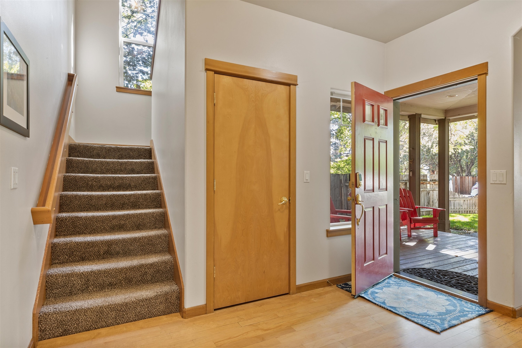 Entry way and stairs to upper level bedrooms. 