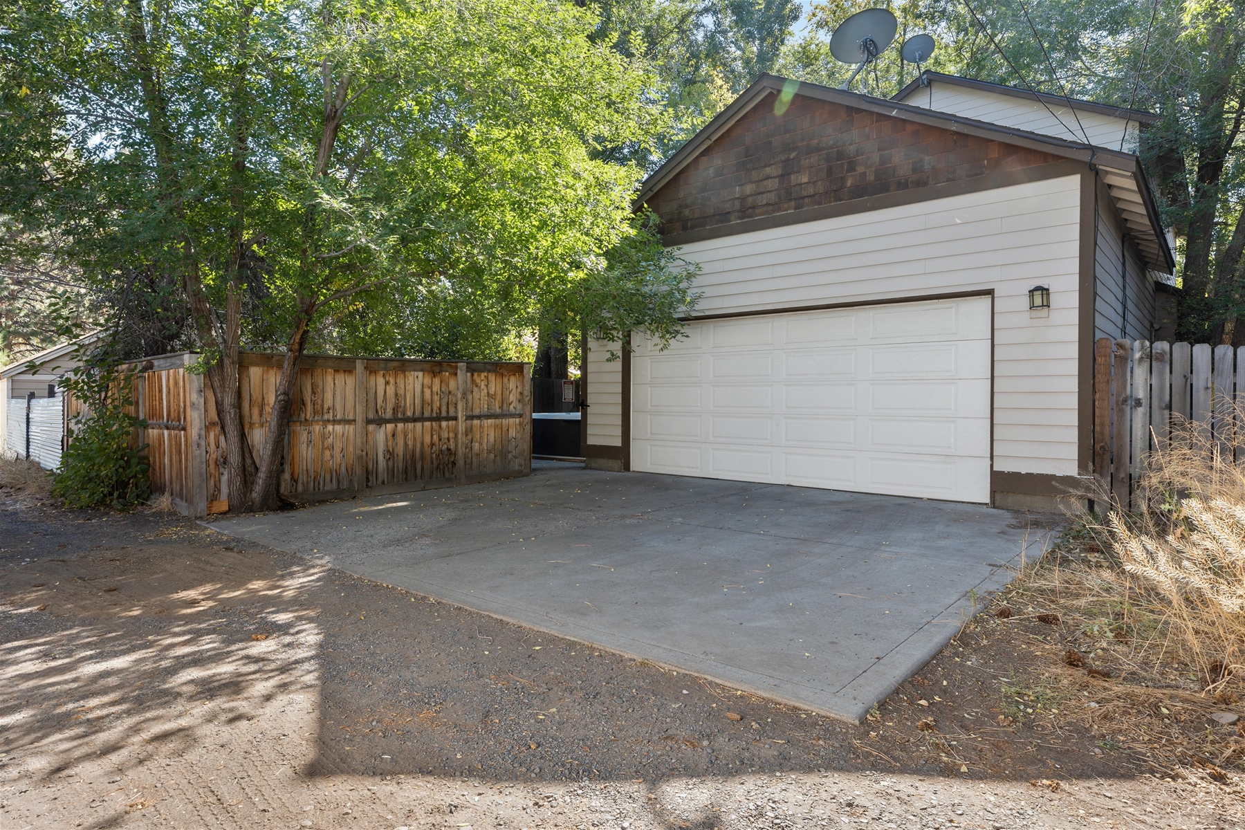 Two car garage and driveway for parking – alley entrance. 