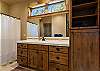 Jack-and-Jill Bathroom with tub/shower combo. 