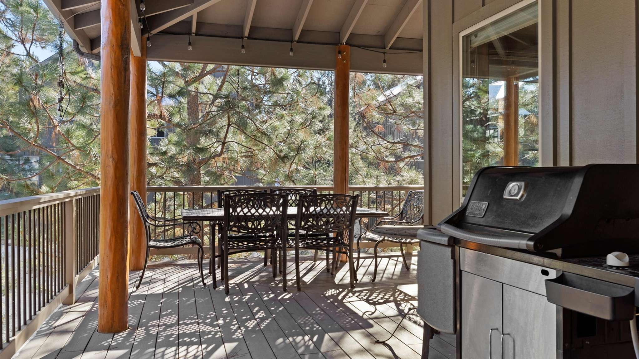 Gas grill and outdoor dining seating for 6 on the deck. 