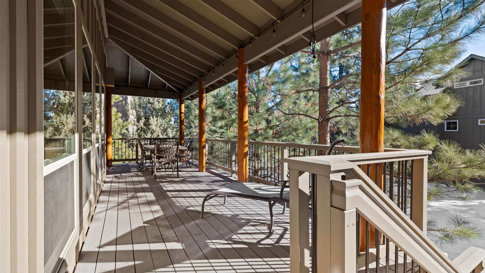 Gas grill and outdoor dining seating for 6 on the deck. 