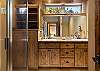King bed, walk-in closet, ensuite bathroom with dual sinks and shower