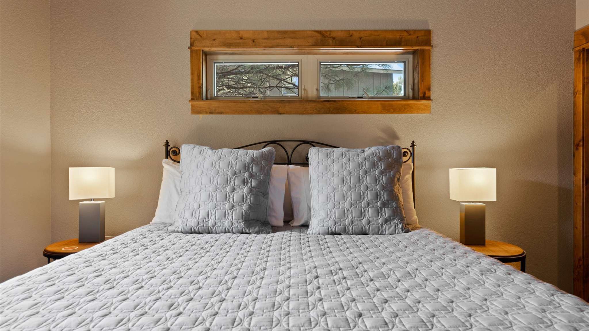 King bed, walk-in closet, ensuite bathroom with dual sinks and shower