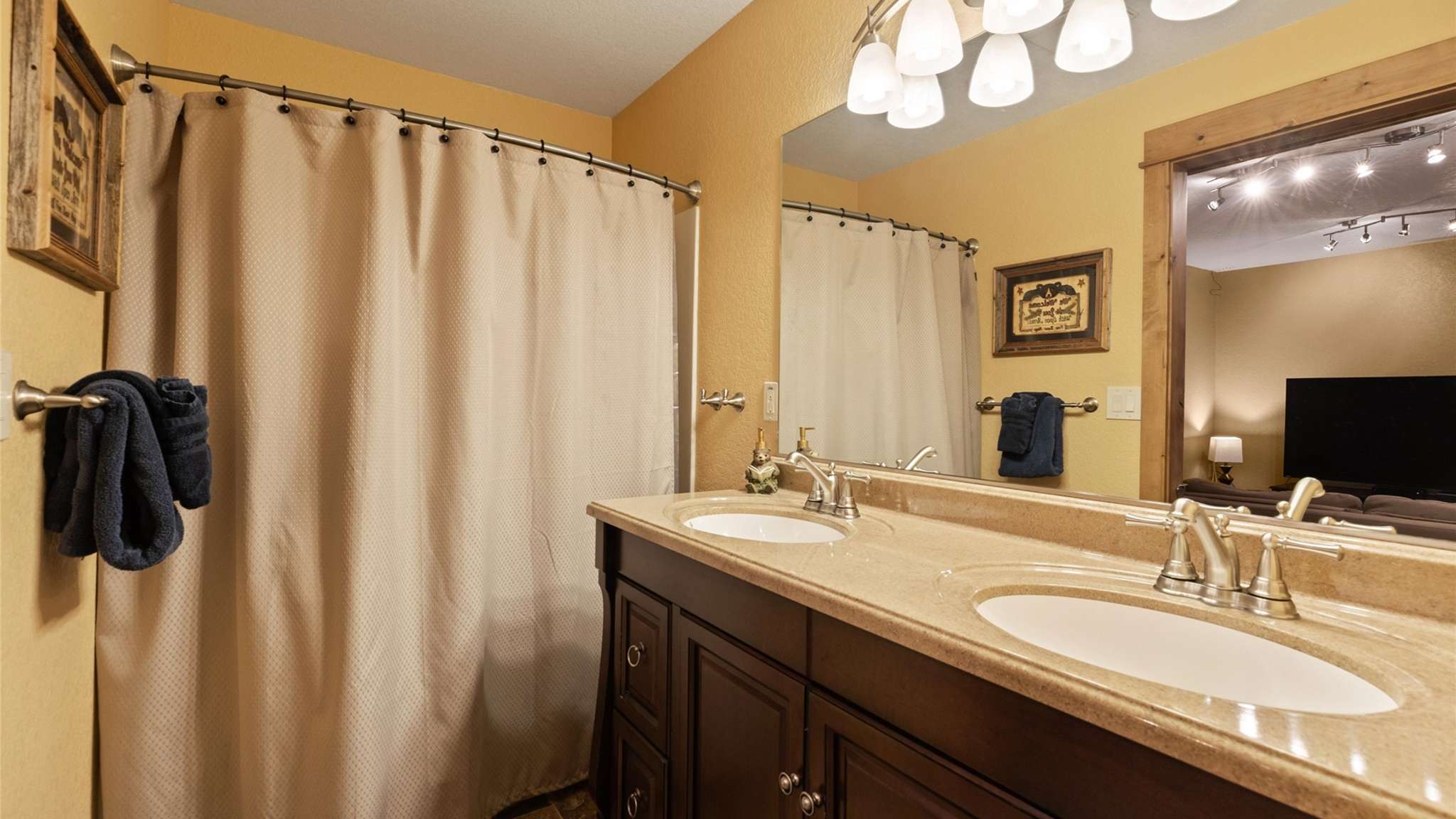 Guest bathroom with tub and shower combo for added flexibility.
