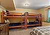 Queen bed and two sets of twin bunks