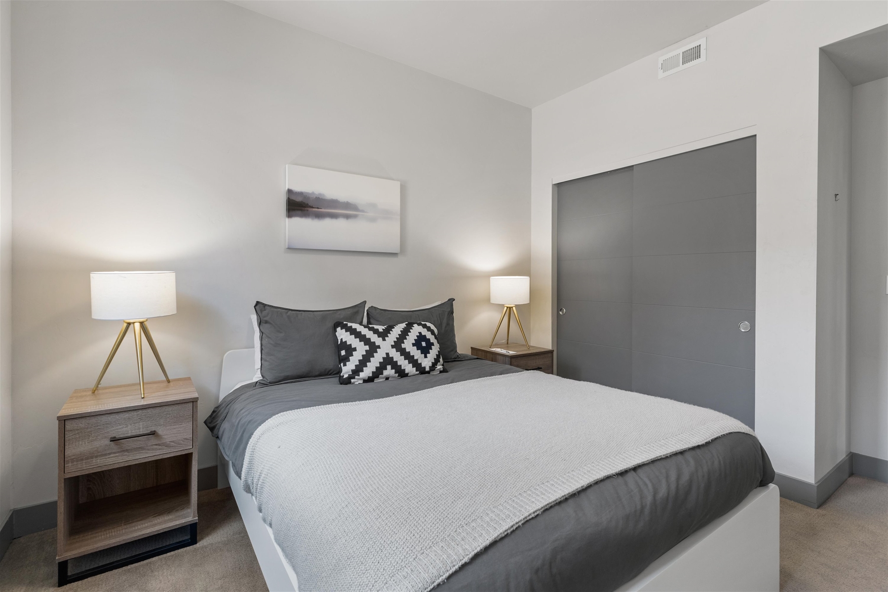 Relax and recharge in this cozy queen bedroom retreat.