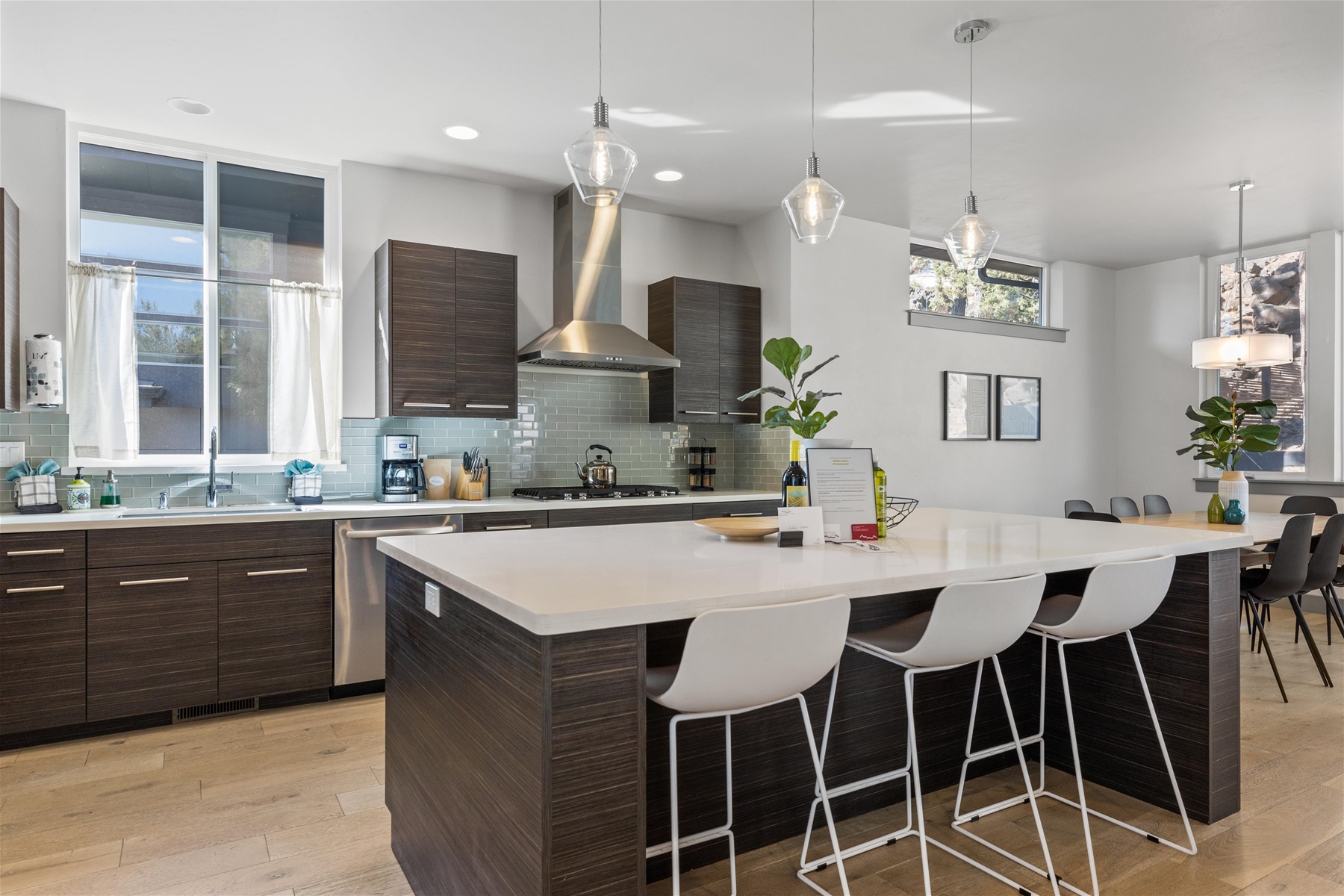 Breakfast bar seating for three in the kitchen area. 