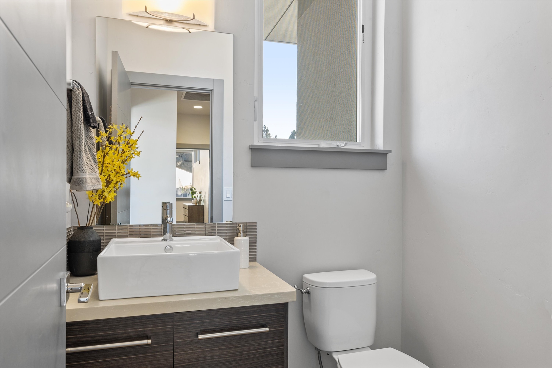 Upstairs main level half bath. 