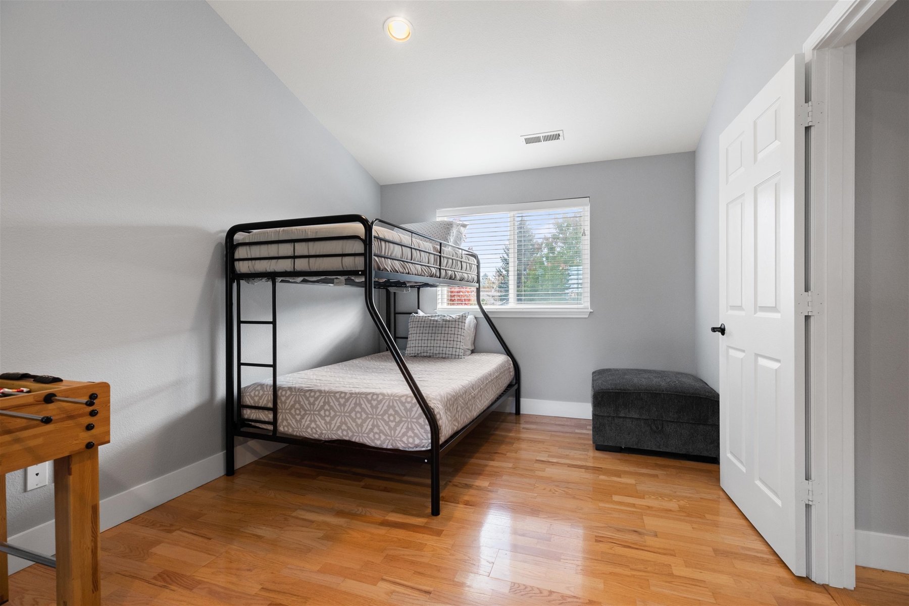 Bunk room with two full/twin bunk beds – includes foosball, flat screen TV, and HDMI hookup for gaming. 