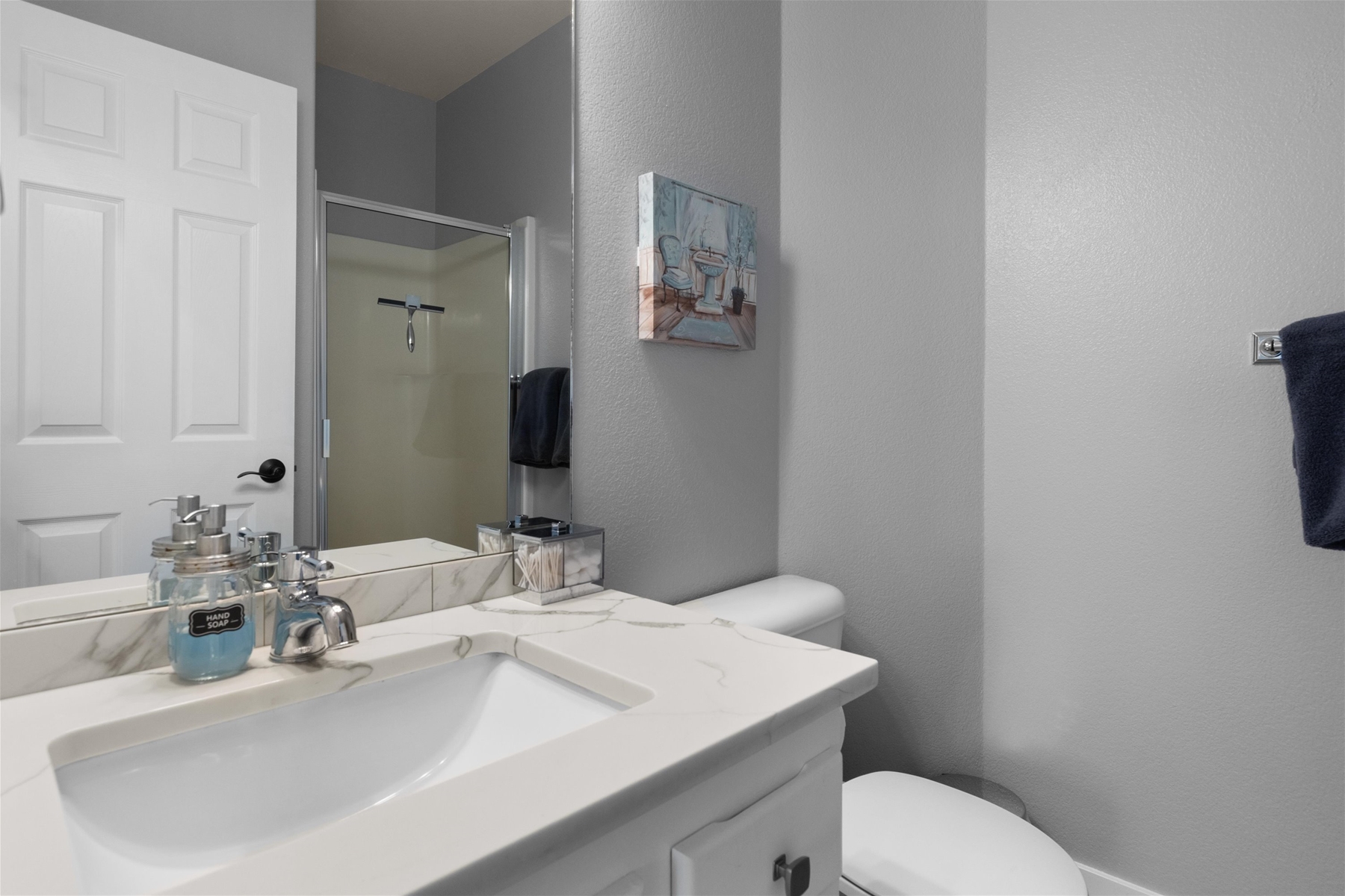 Guest bath with shower (main level).