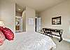 Queen guest suite with work desk — ideal for remote workers visiting Bend OR.