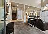 Open floor plan with tiled entry.