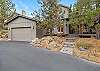Exterior of Rafters Court vacation rental with attached garage — River Wild, Mt. Bachelor Village Resort, Bend OR.