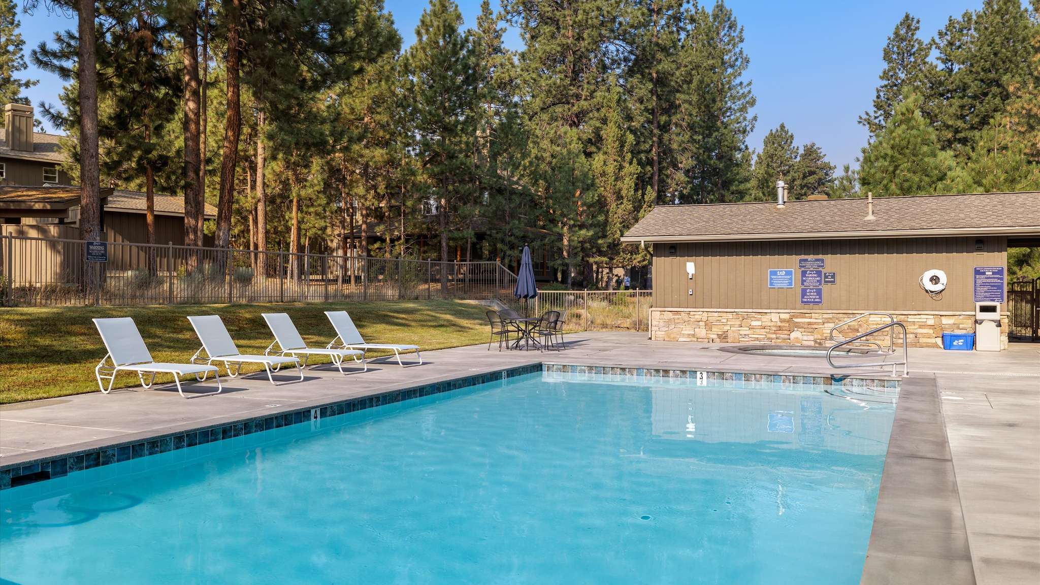 Seasonal community pool at River Wild, Mt. Bachelor Village Resort — steps from Rafters Court vacation rental, Bend OR.