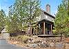 Modern exterior of Rafters Court surrounded by pines — River Wild, Mt. Bachelor Village Resort, Bend OR.