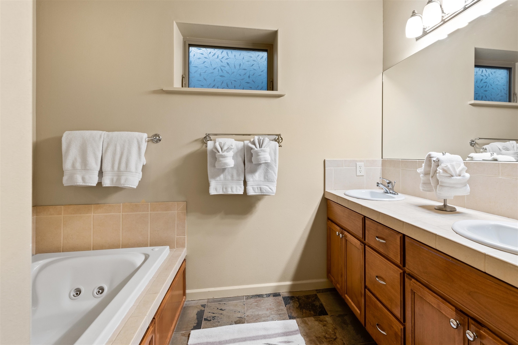 Guest bathroom with jetted sunken tub (lower level).