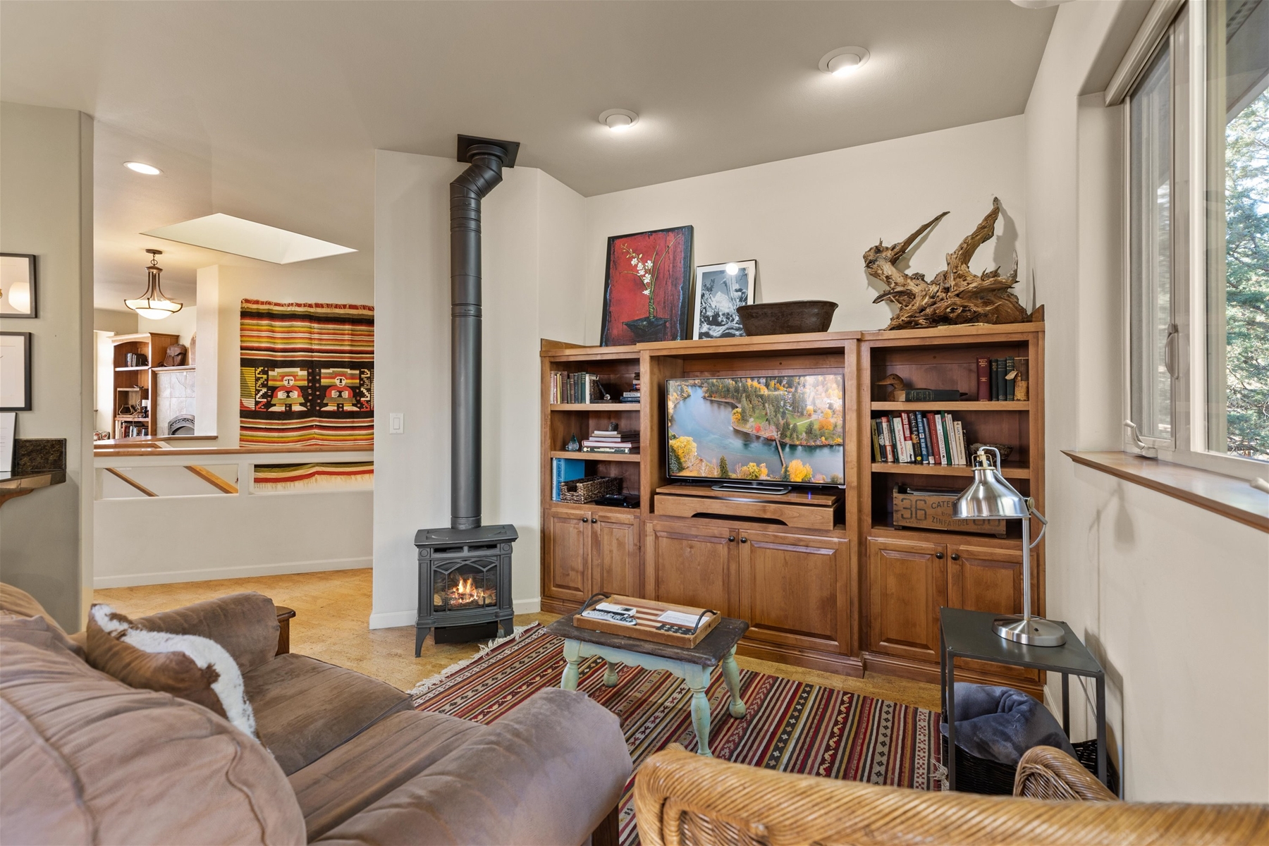 Upstairs living area with gas wood stove. 