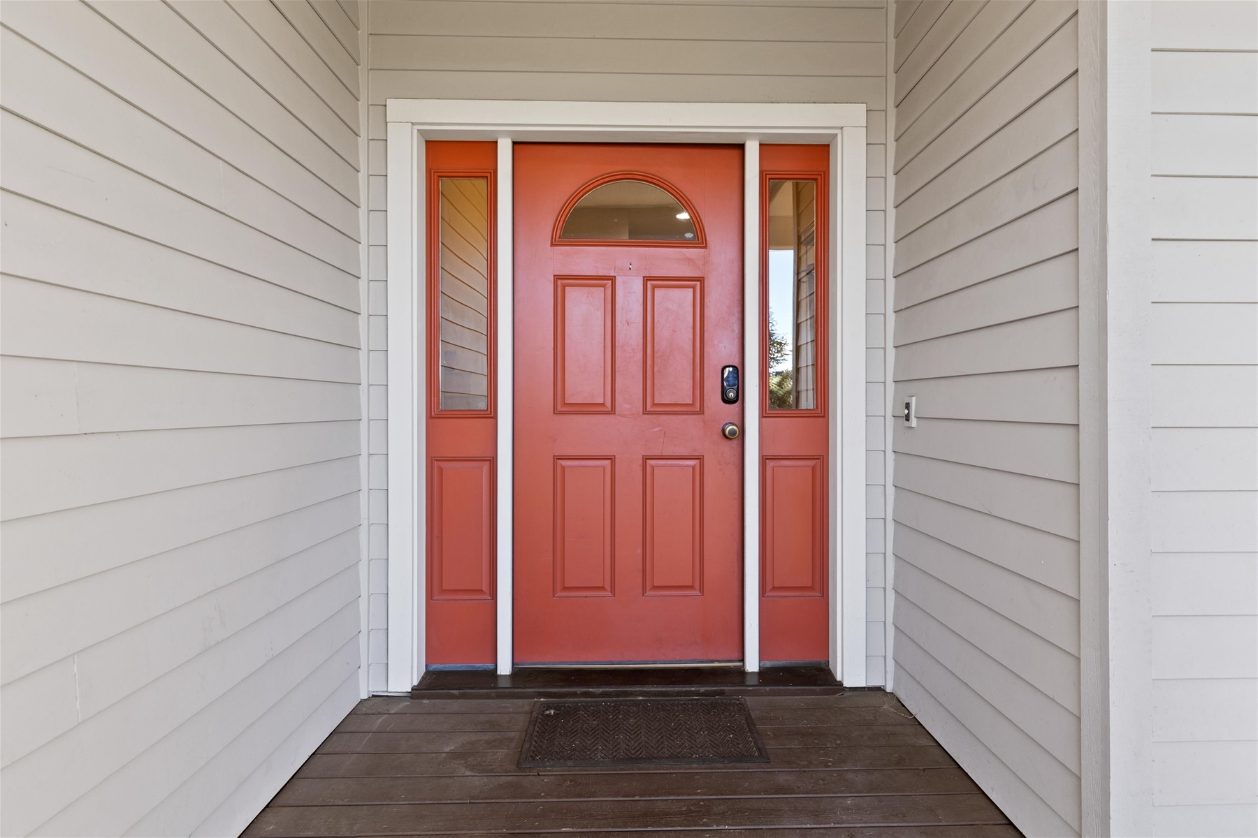Signature red front door welcomes you to our home. 
