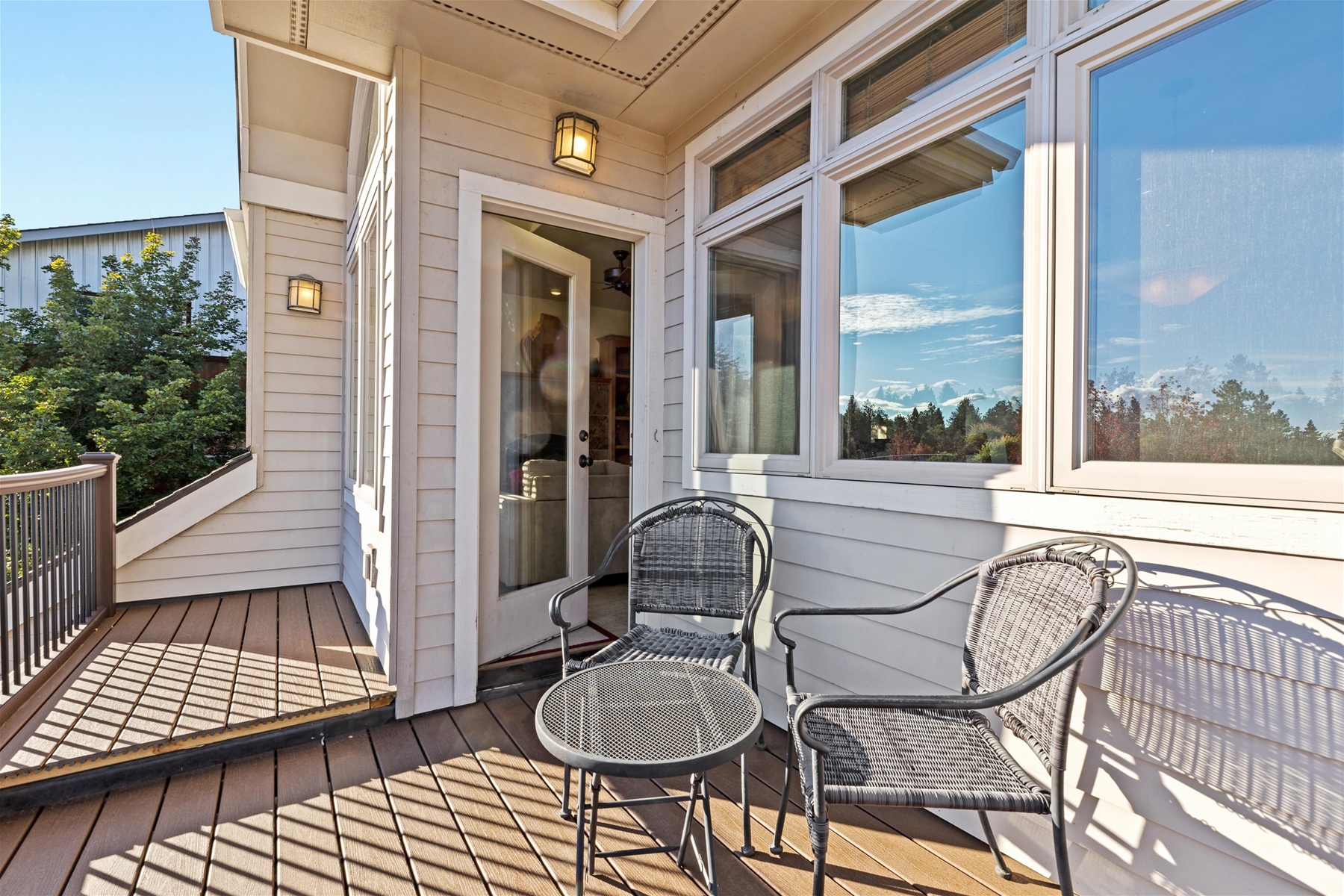 Small outdoor seating area on the balcony.