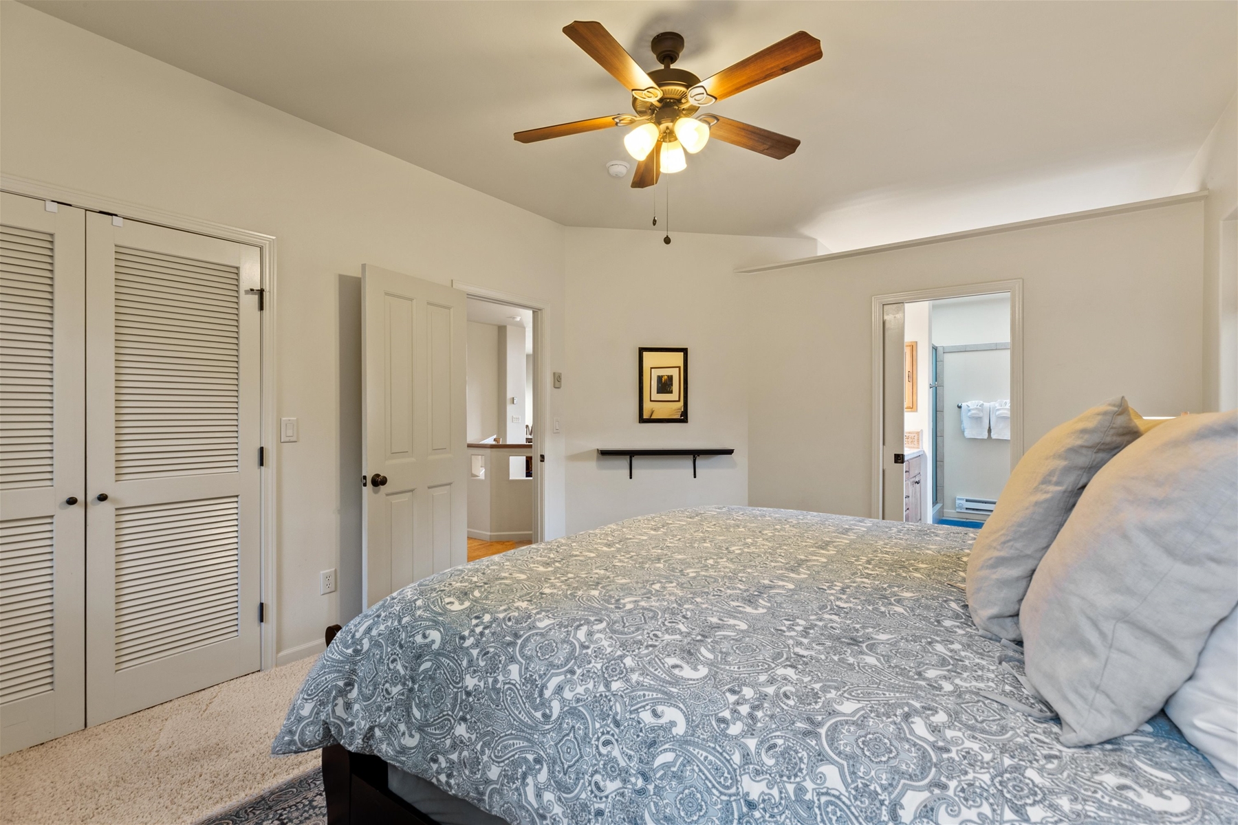 King main suite with private bathroom (upper level).
