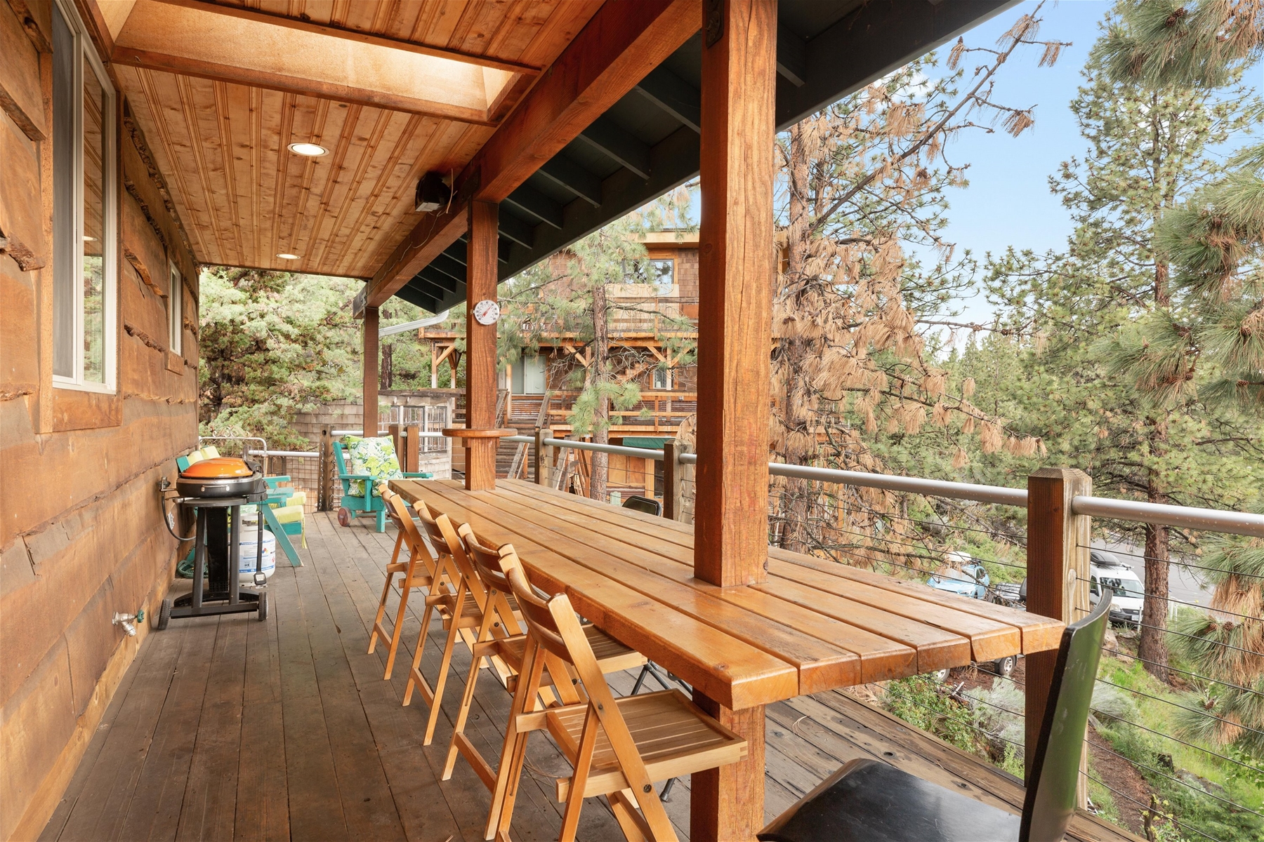 Enjoy outdoor community seating with beautiful views on expansive deck at the Fun House. 